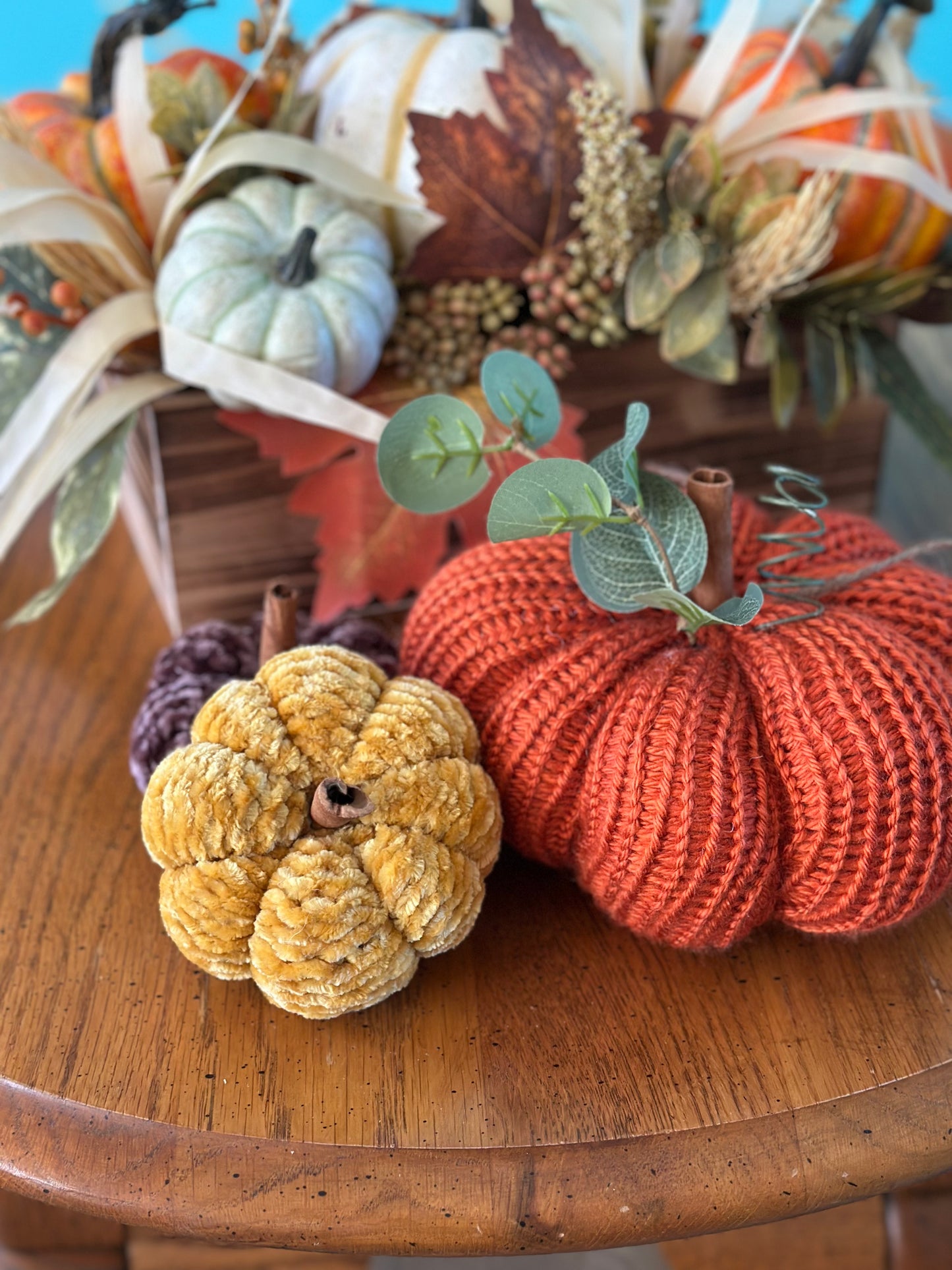 knit segmented pumpkin with greenery