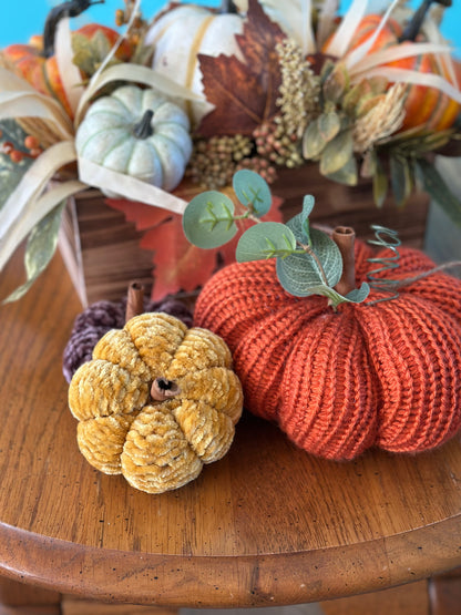 knit segmented pumpkin with greenery