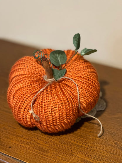 knit segmented pumpkin with greenery