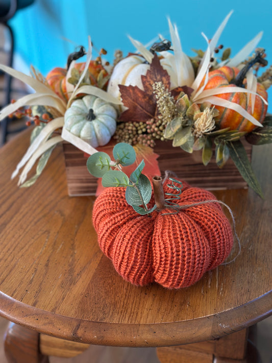 knit segmented pumpkin with greenery