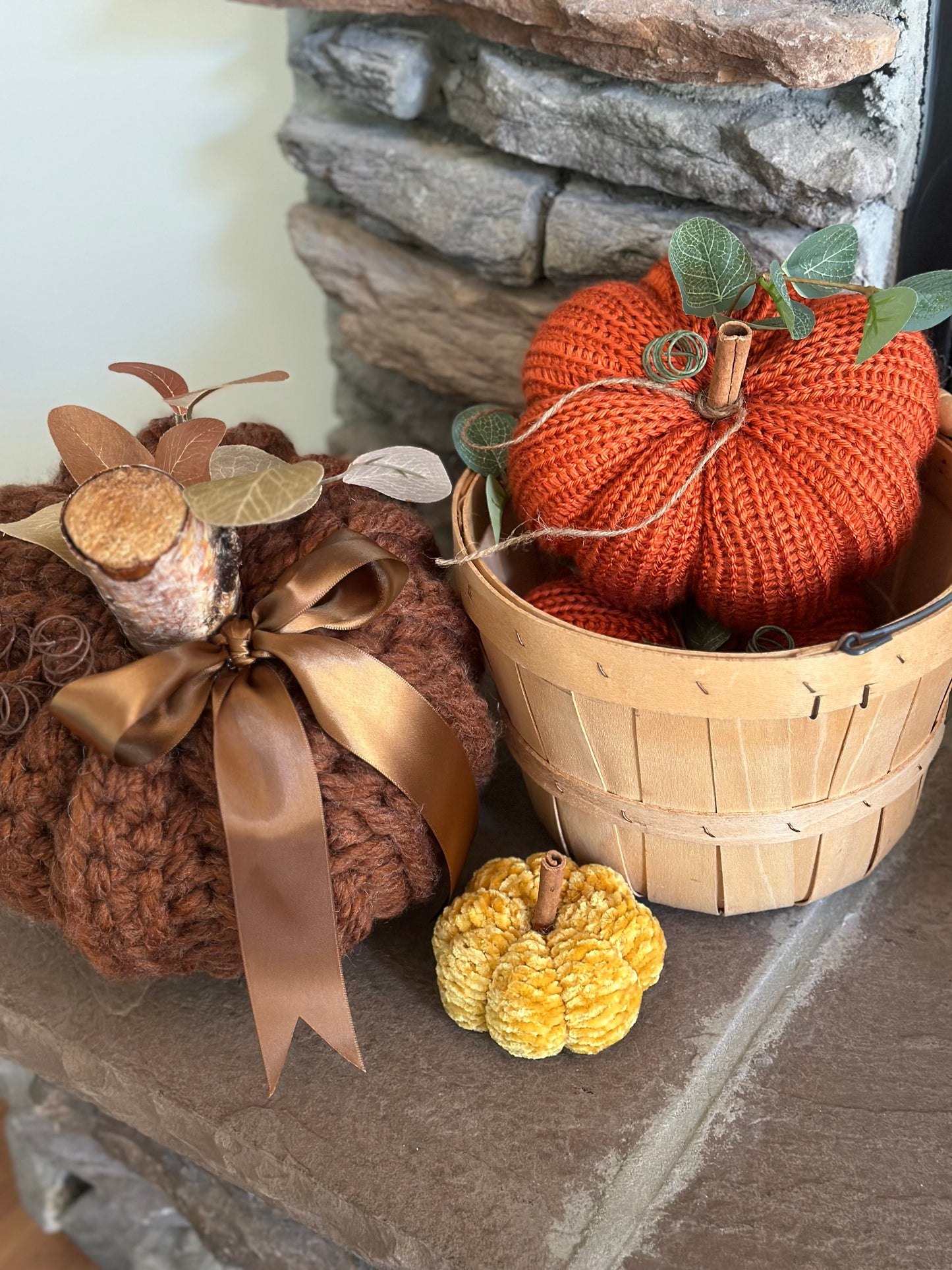 knit segmented pumpkin with greenery